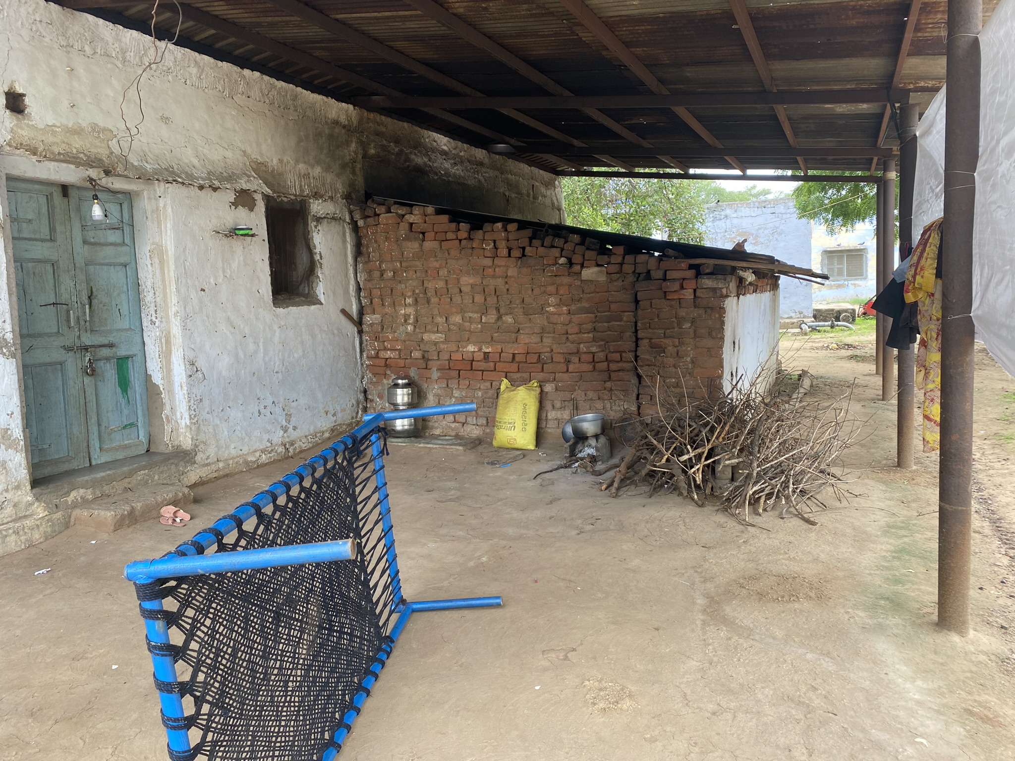 Rural household cooking area with wood-fired stove